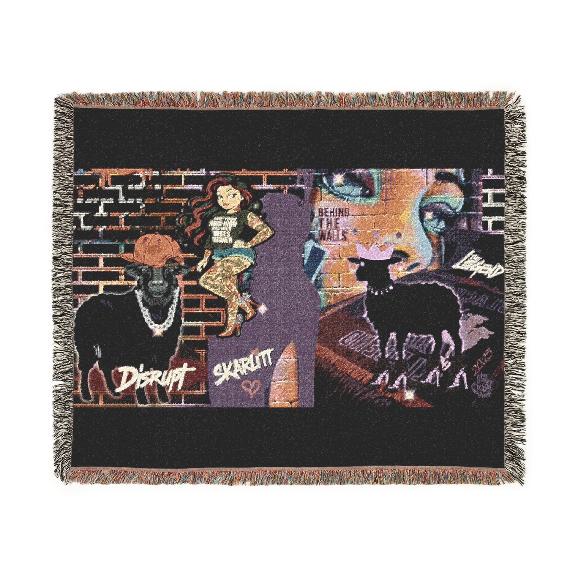 Woven blanket with artistic design featuring animals and text on a black background