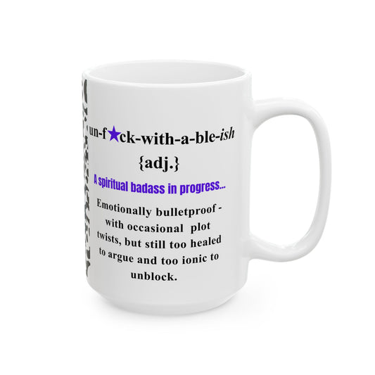 White mug with black text definition on a white background. the bean grind